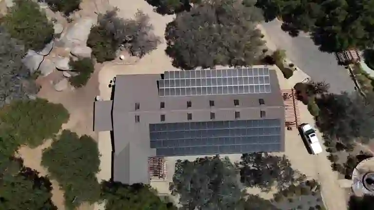 Aerial drone view of Don Francisco’s ranch rooftop solar array layout in Temecula, CA